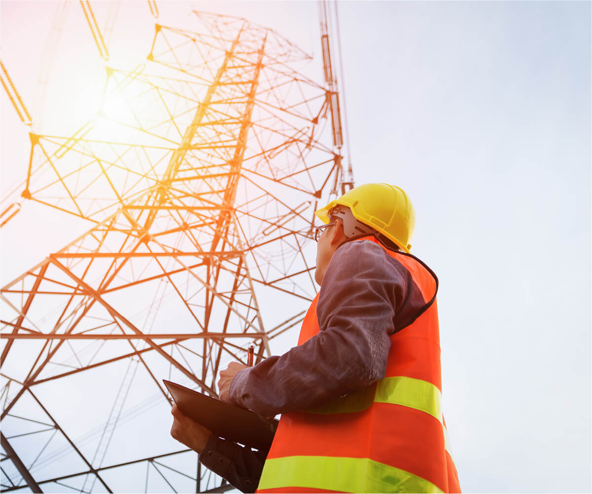 Man Next To Tower